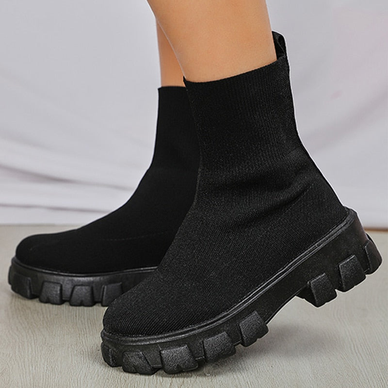 Trendy green women's slip-on Paris boots, comfortable ankle boots for versatile, everyday fashion statements.