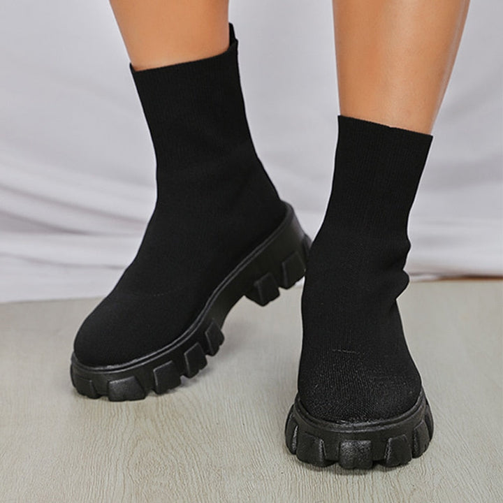 Fashionable women's slip-on Paris boots, comfortable ankle boots perfect for versatile styling and daily use.