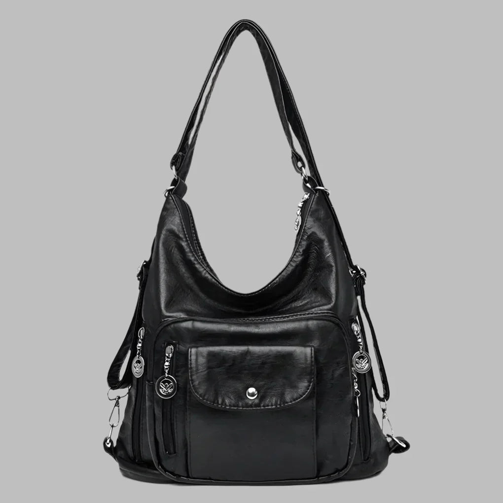 Chic women's slouchy tote bag. A trendy large shoulder handbag, available in red, gray, black, and brown for any outfit.