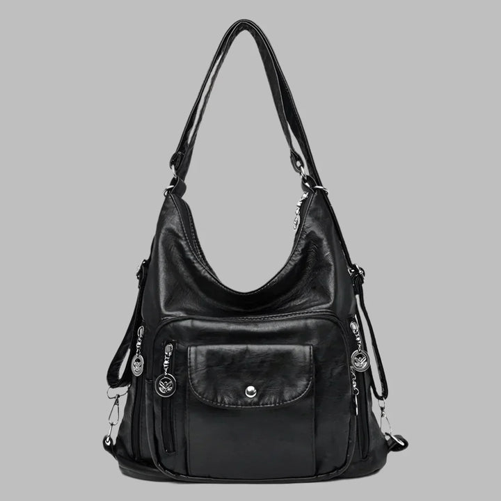 Chic women's slouchy tote bag. A trendy large shoulder handbag, available in red, gray, black, and brown for any outfit.