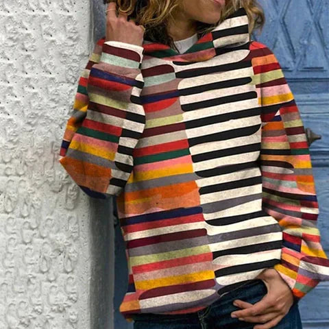 Women's stylish striped hoodie, perfect for casual everyday wear. Comfortable hooded sweatshirt with a relaxed fit.