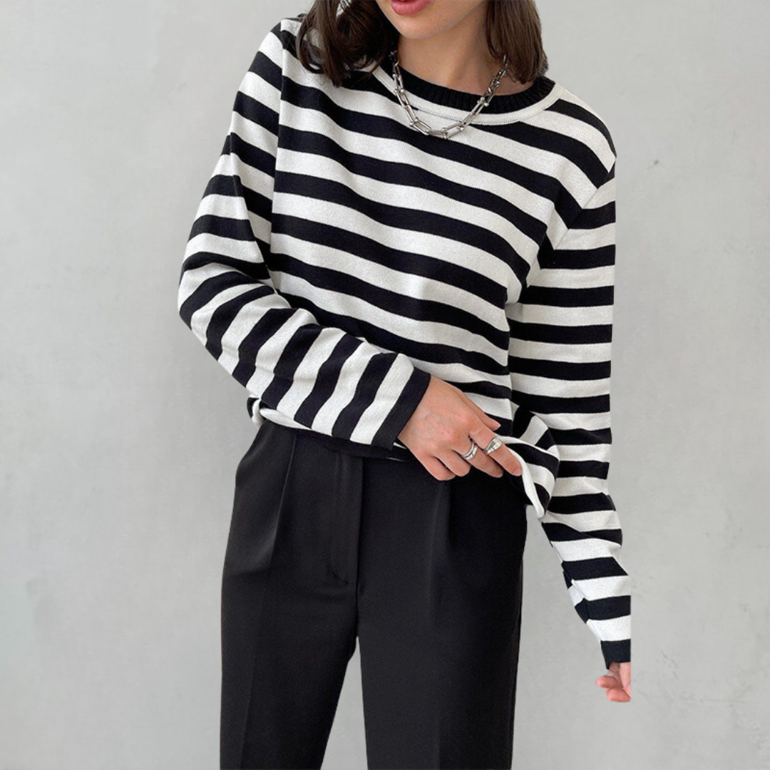 Casual women's long-sleeve striped top. This comfortable T-shirt is a versatile wardrobe essential.
