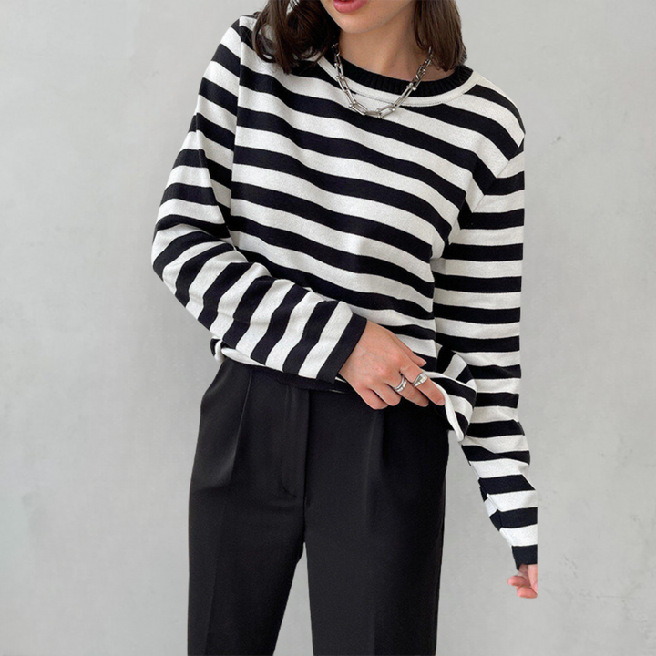 Casual women's long-sleeve striped top. This comfortable T-shirt is a versatile wardrobe essential.
