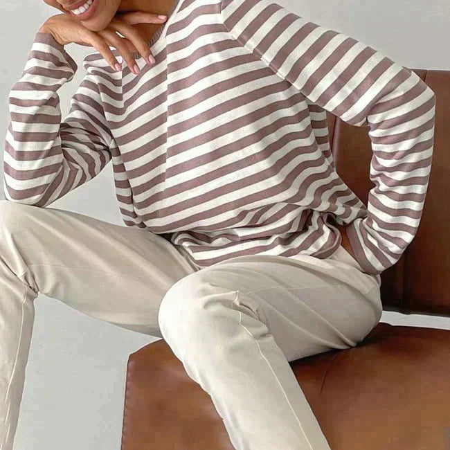 Fashionable striped long-sleeve T-shirt for women. A comfortable & stylish everyday top.