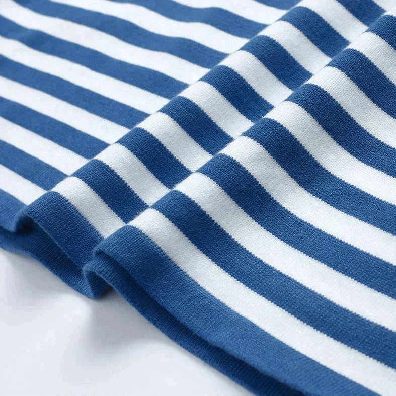 Stylish striped women's top with long sleeves. Perfect versatile T-shirt for any casual outfit.