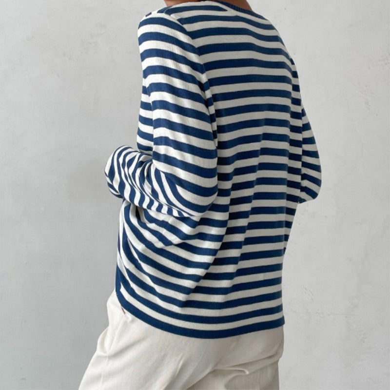 Versatile women's striped long-sleeve top. This round neck tee offers comfort & style for any occasion.