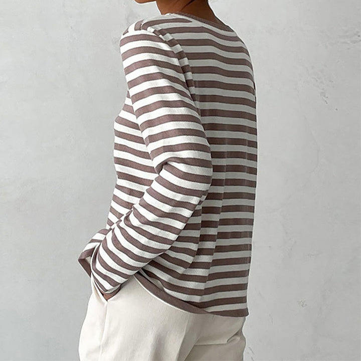 Classic striped long-sleeve T-shirt for women. A stylish & comfortable casual wear essential.
