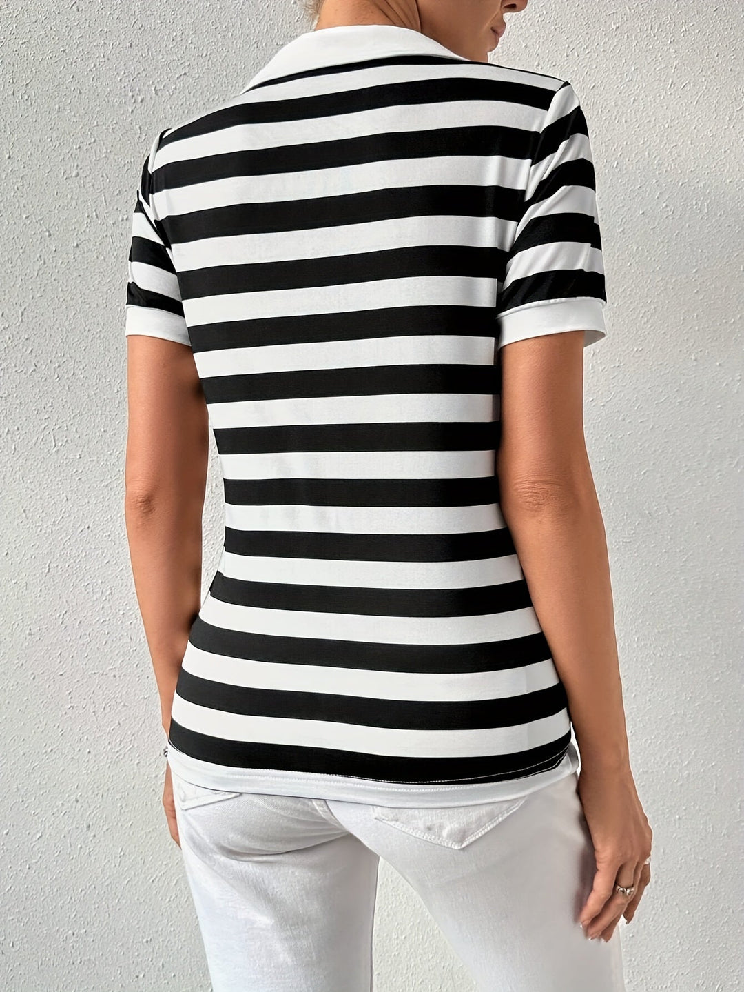 Fashionable women's striped short sleeve top, designed for effortless chic and relaxed everyday styling.