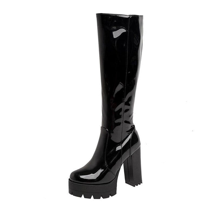 Women's stylish studded long boots with platform heel. Elegant fall fashion footwear for parties & winter trends.