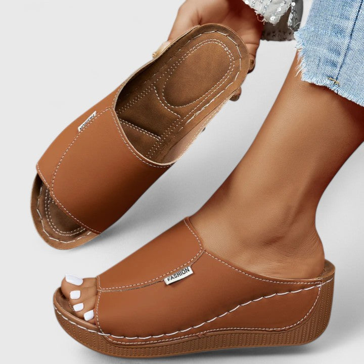 Elegant women's slip-on sandals, ideal casual summer footwear for comfort & style. Perfect for travel.