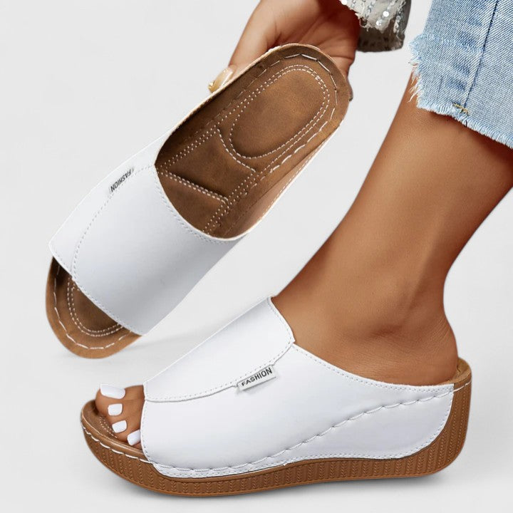 Stylish women's comfort sandals, essential summer footwear for travel & casual elegant looks. Open-toe.