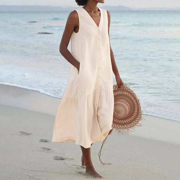 Chic women's V-neck summer dress, midi length, flattering fit, perfect as a versatile spring & summer outfit.