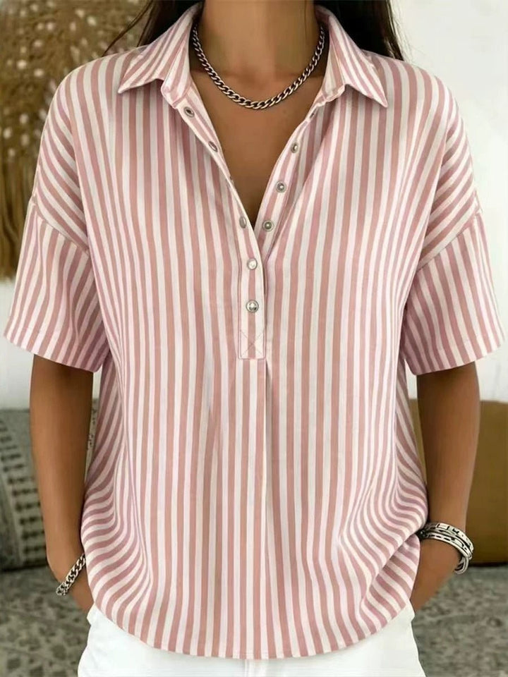 Versatile women's half-button blouse with vertical stripes, suitable for summer or weekend style.