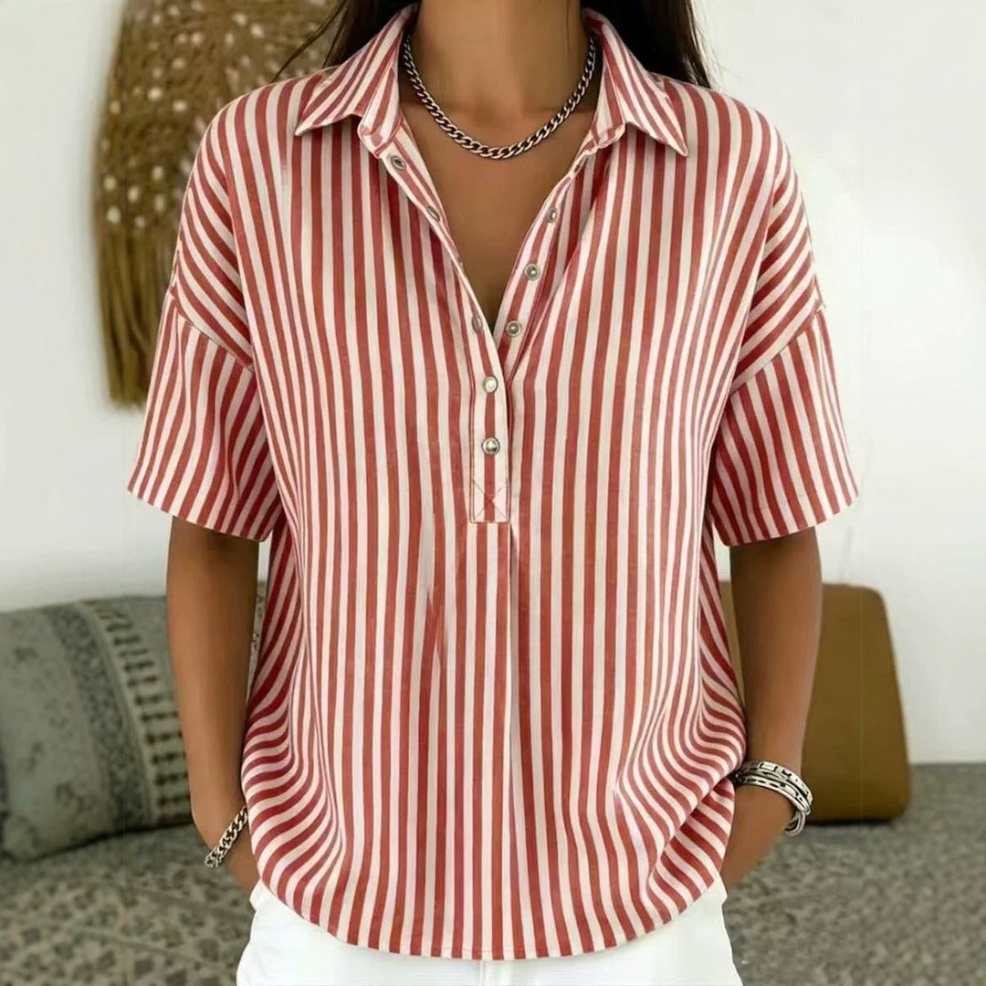 Chic women's striped half-button top, great for a stylish casual look or office attire.