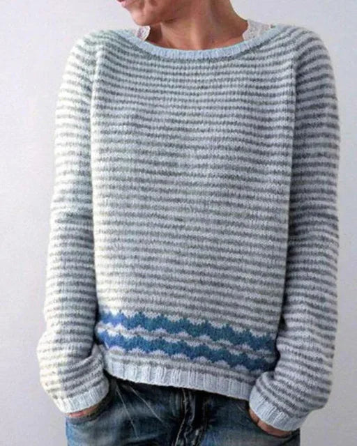 Warm Nova women's long sleeve sweater, an essential fashion top for comfortable and stylish winter days.