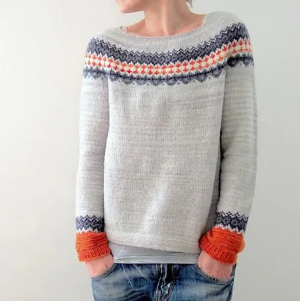 Detailed view of Nova women's sweater long sleeves, highlighting elegant knit and warm winter design.
