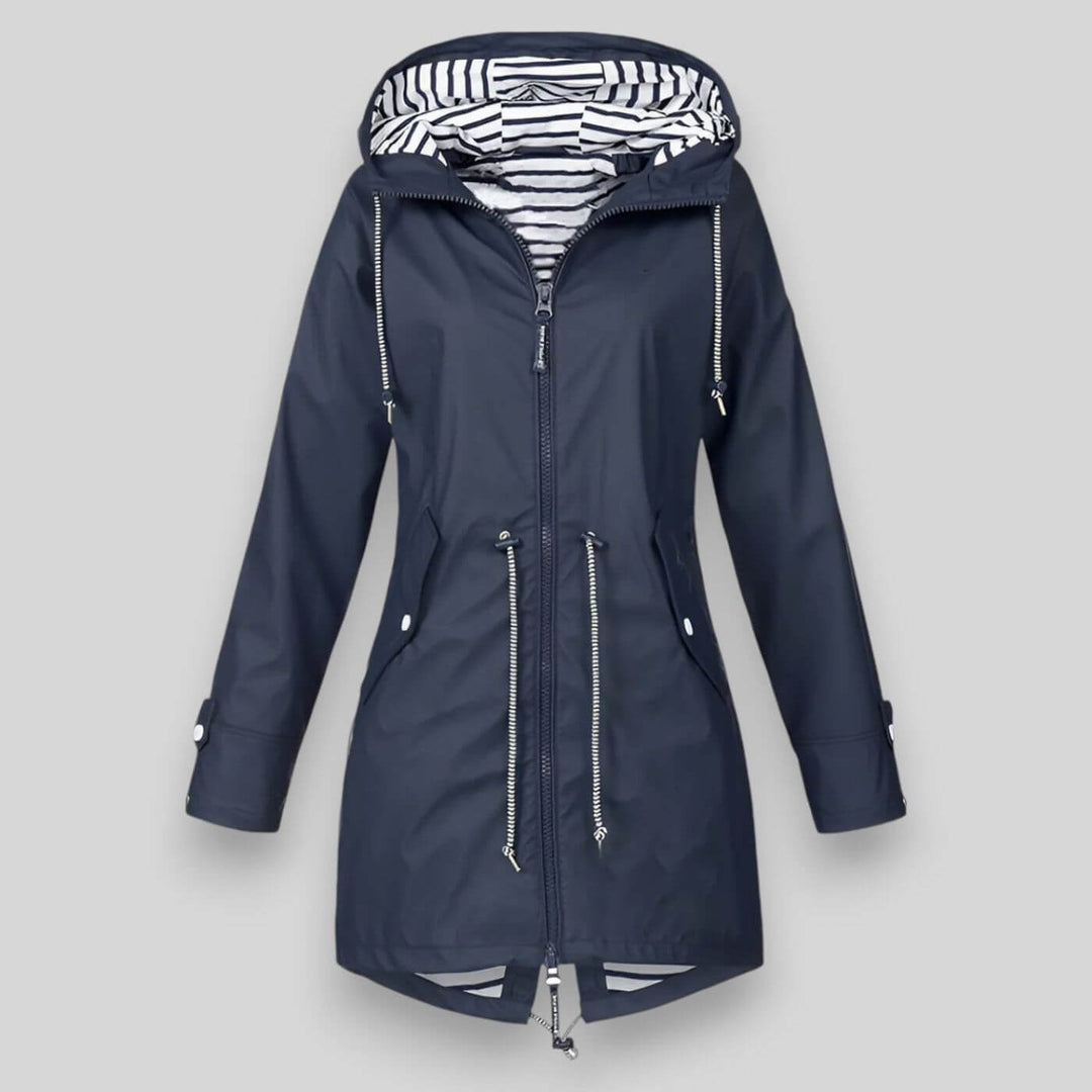 Women's stylish waterproof rain jacket for ultimate dryness & comfort. Lightweight, breathable all-weather protection.