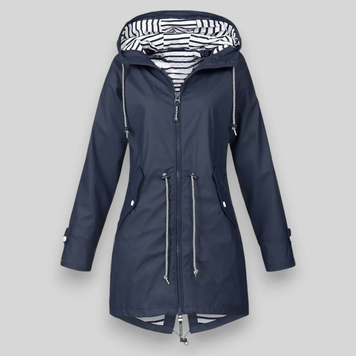 Women's stylish waterproof rain jacket for ultimate dryness & comfort. Lightweight, breathable all-weather protection.
