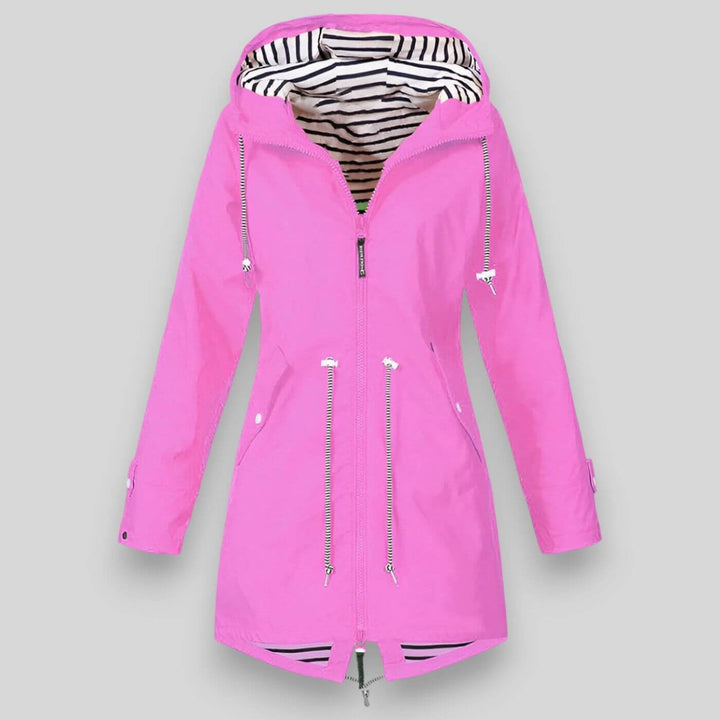Lightweight women's rain jacket, ideal for daily wear & travel. Stylish, breathable & waterproof for protection.