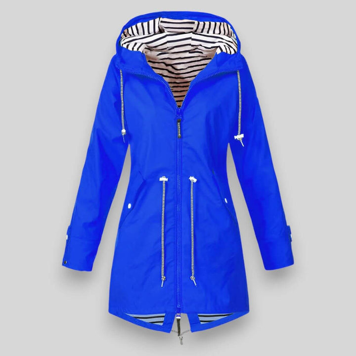 Fashionable women's waterproof rain jacket, combining style with essential protection. All-weather outerwear.
