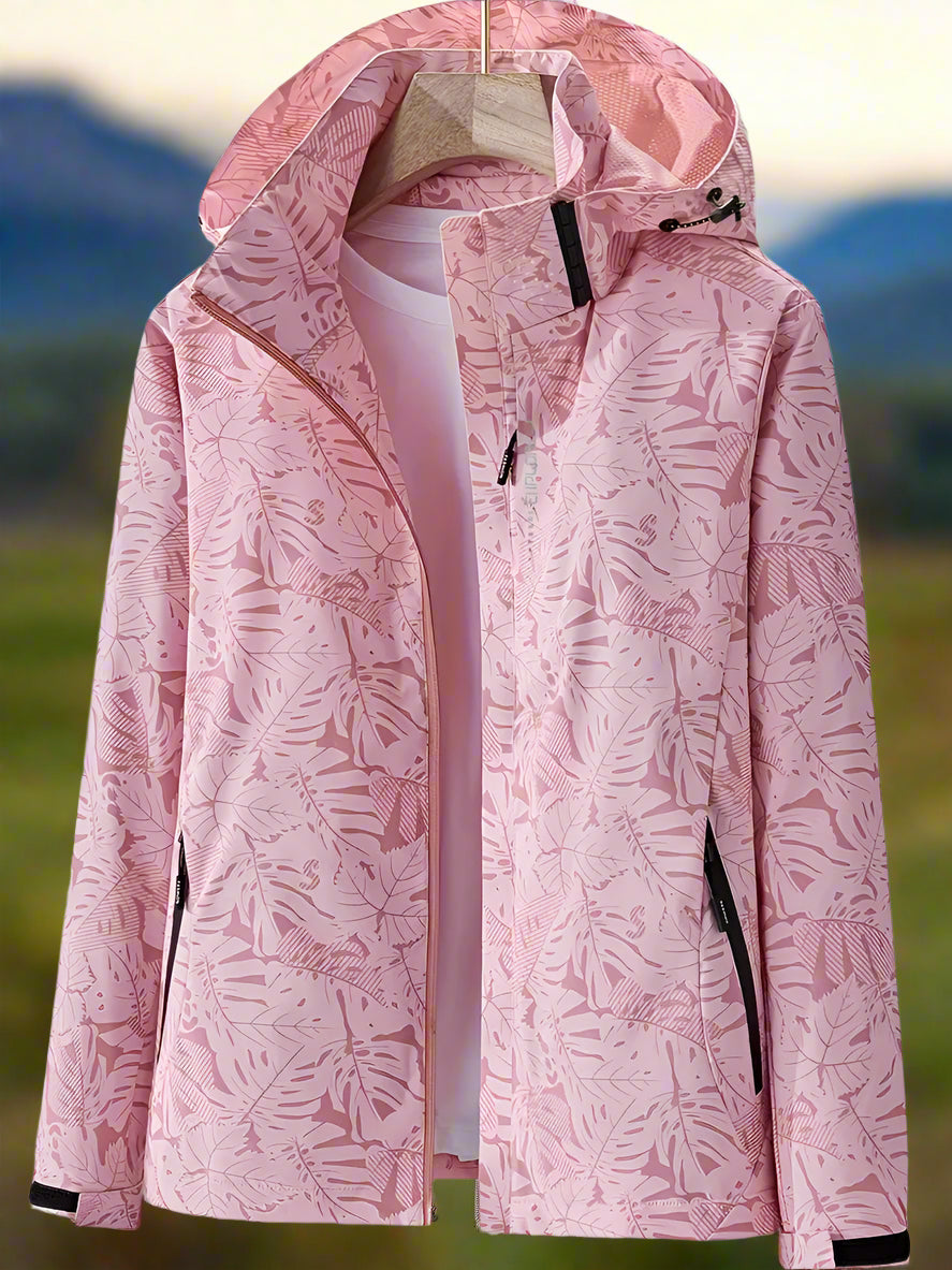 Women's outdoor waterproof jacket. Summer-ready with a fresh leaf print, lightweight and practical for all activities.