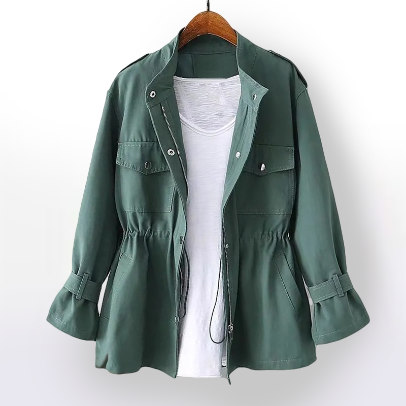 Fashionable women's waterproof rain coat. Features a flattering cinched waist for an elegant, practical style.