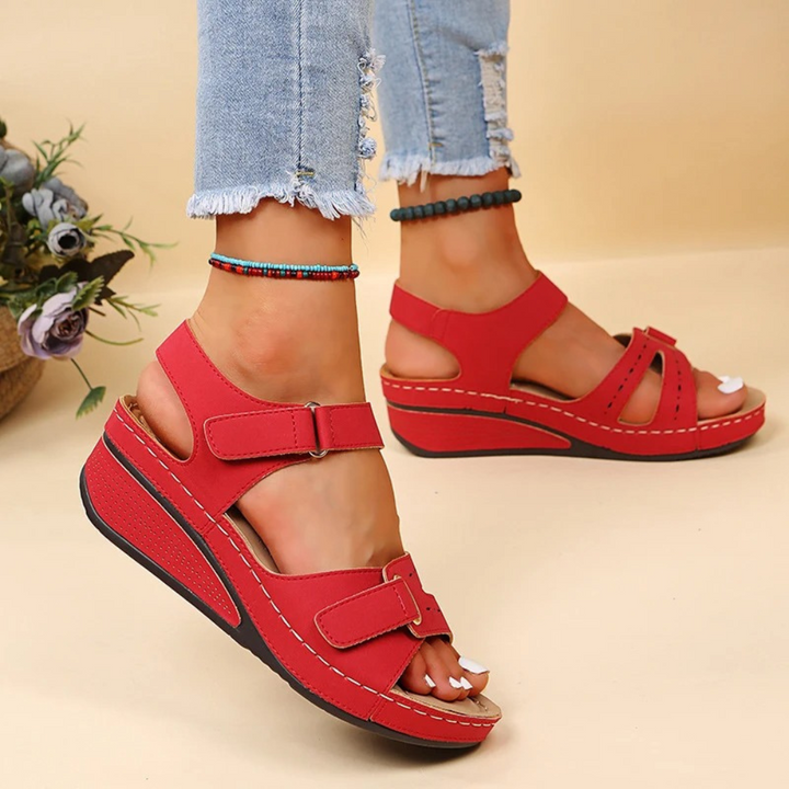 Comfortable women's wedge heel sandals with orthopedic arch support for foot pain relief.