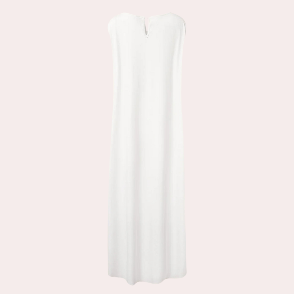 Stylish white relaxed fit women's tunic top. Modern and comfortable, great for casual wear.