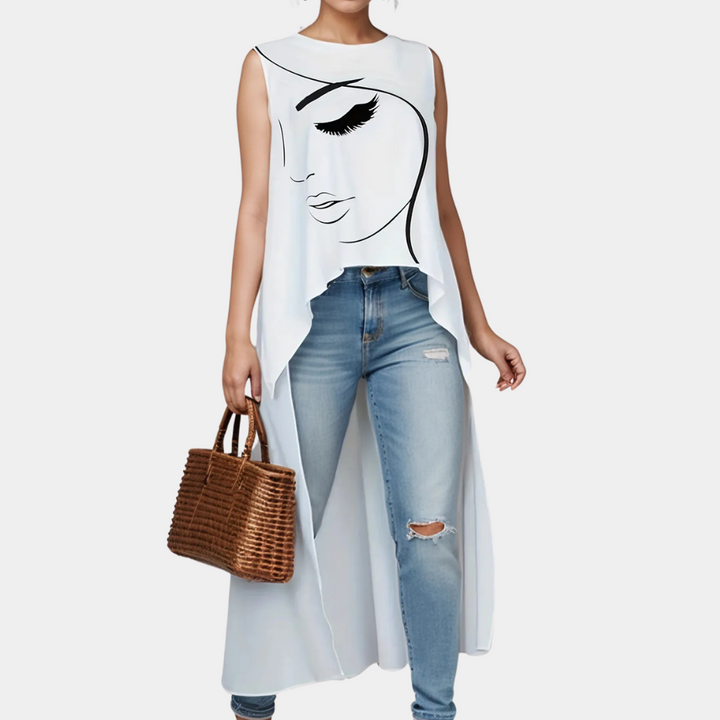 Chic women's white relaxed fit tunic top. A stylish and versatile ladies' top for modern spring fashion.