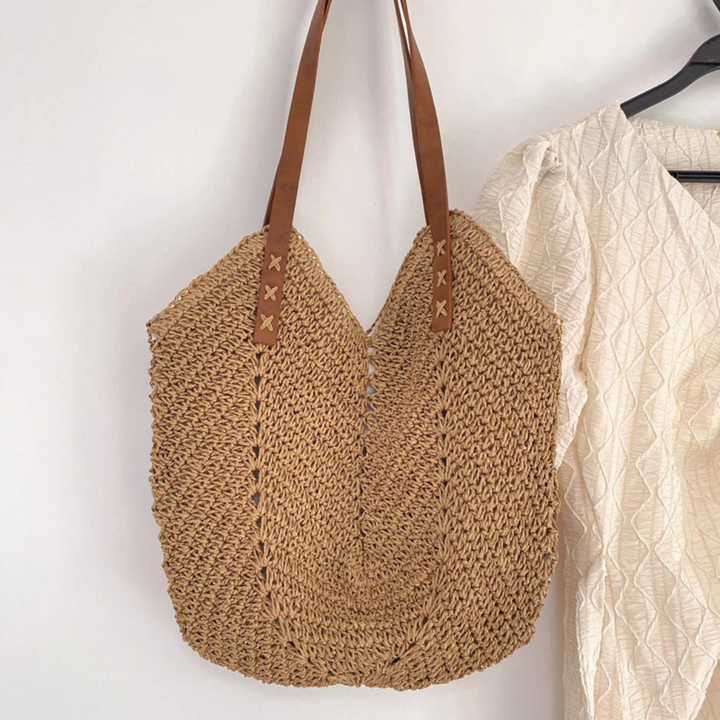 Women's stylish white woven shoulder bag, perfect for versatile everyday casual fashion.