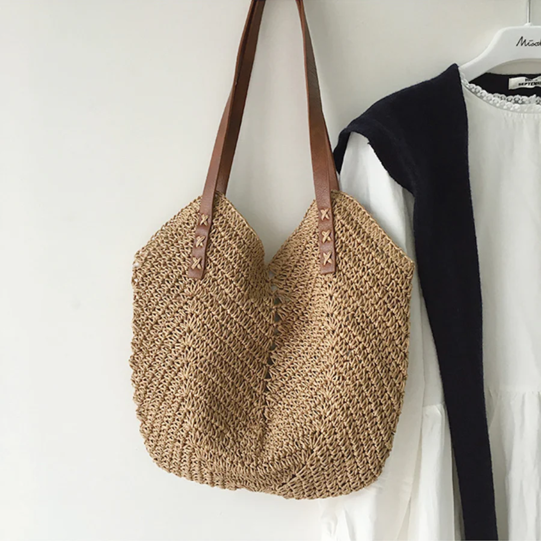 Chic brown woven shoulder bag for women, a versatile everyday carry accessory.