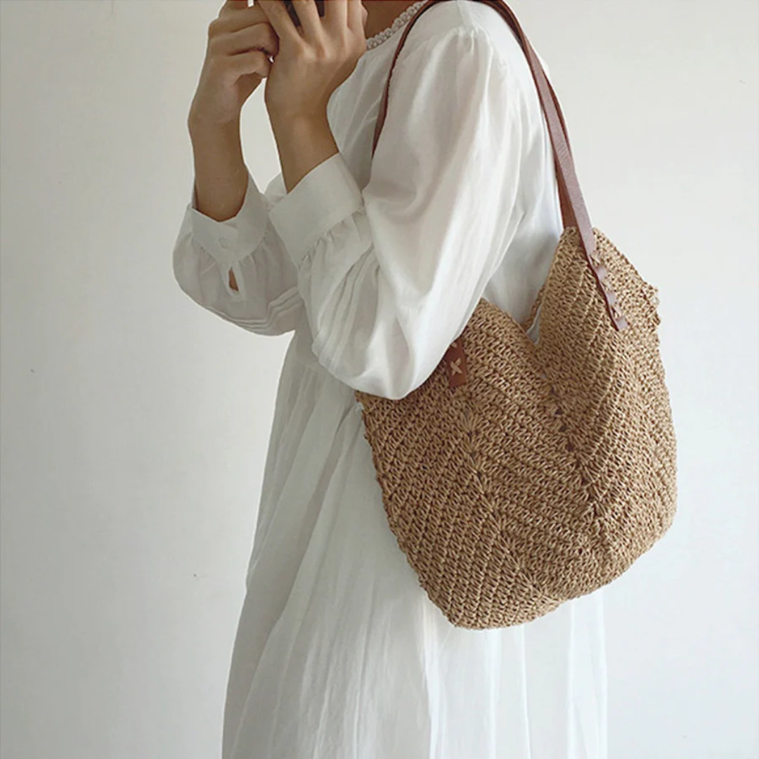 Elegant brown woven shoulder bag, a stylish and practical women's accessory for daily wear.