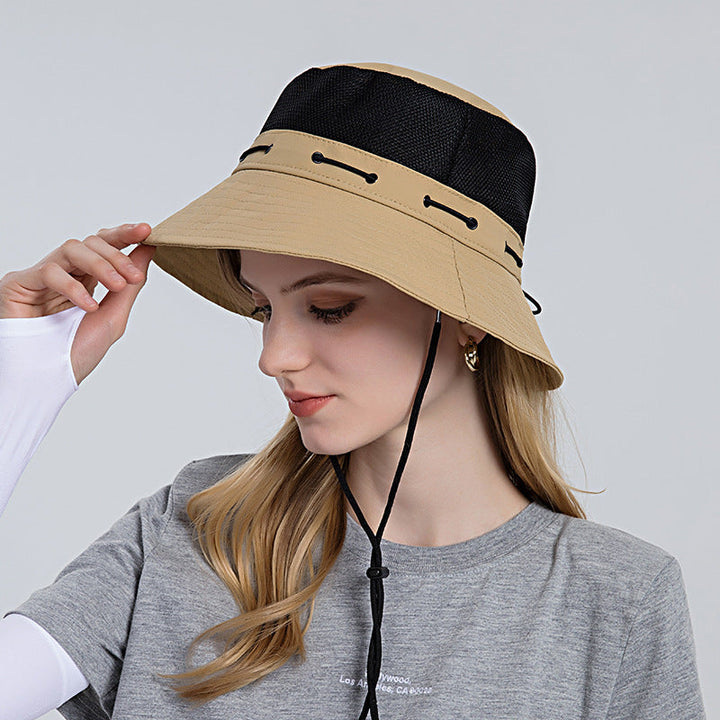 Women's stylish wide-brim sun hat, breathable for UV protection, perfect for summer beaches.