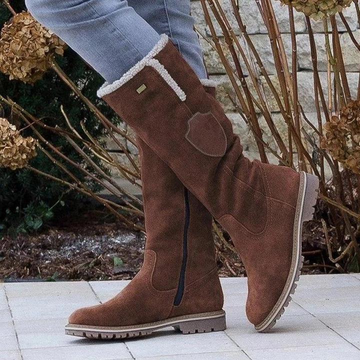 Women's stylish winter boots, cozy & warm for cold weather. Features non-slip sole for everyday comfort.