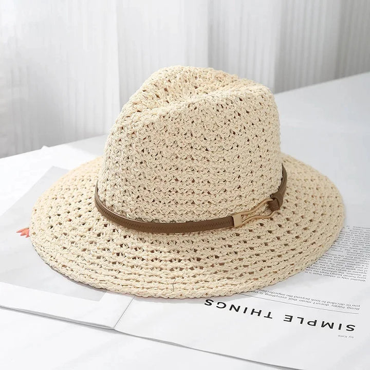 Black women's woven fedora hat, a stylish and protective sun hat for summer adventures.