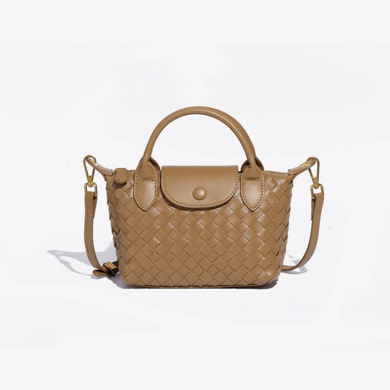 Fashion-forward woven mini handbag, women's compact faux leather design.