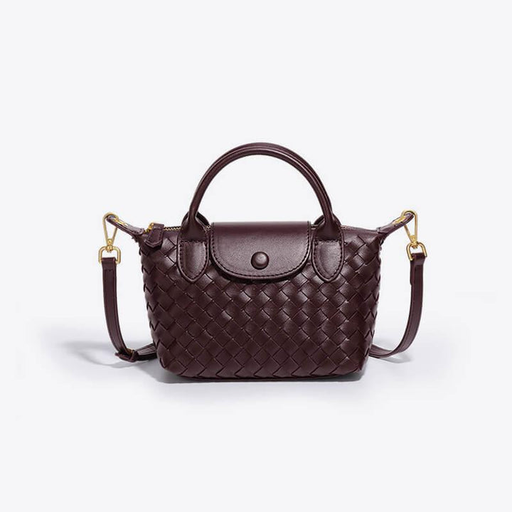 Versatile woven mini shoulder bag for women, chic faux leather construction.