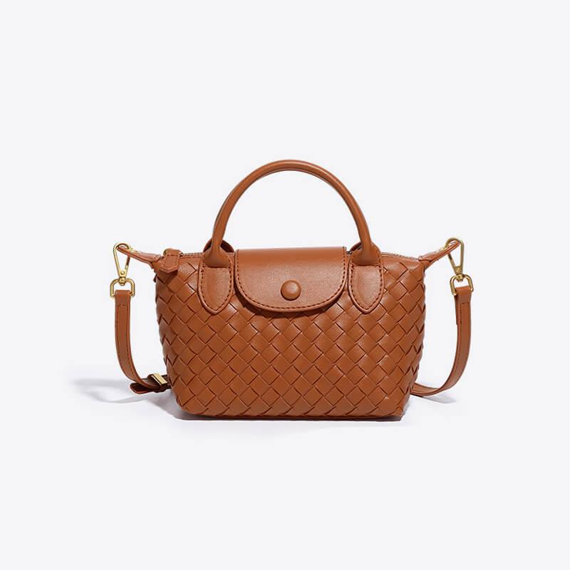 Women's everyday mini bag, woven faux leather construction, sleek and stylish.