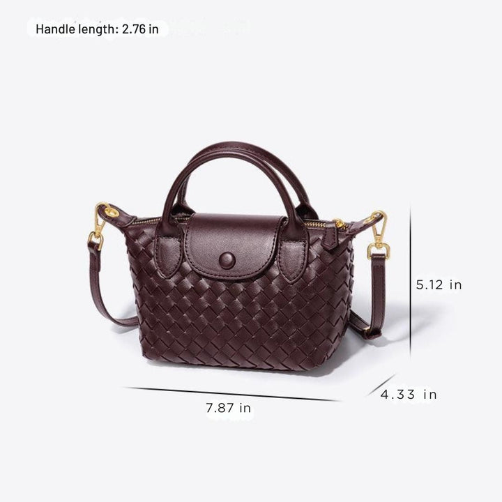 Elegant women's faux leather mini bag, intricate woven details, a stylish accessory.