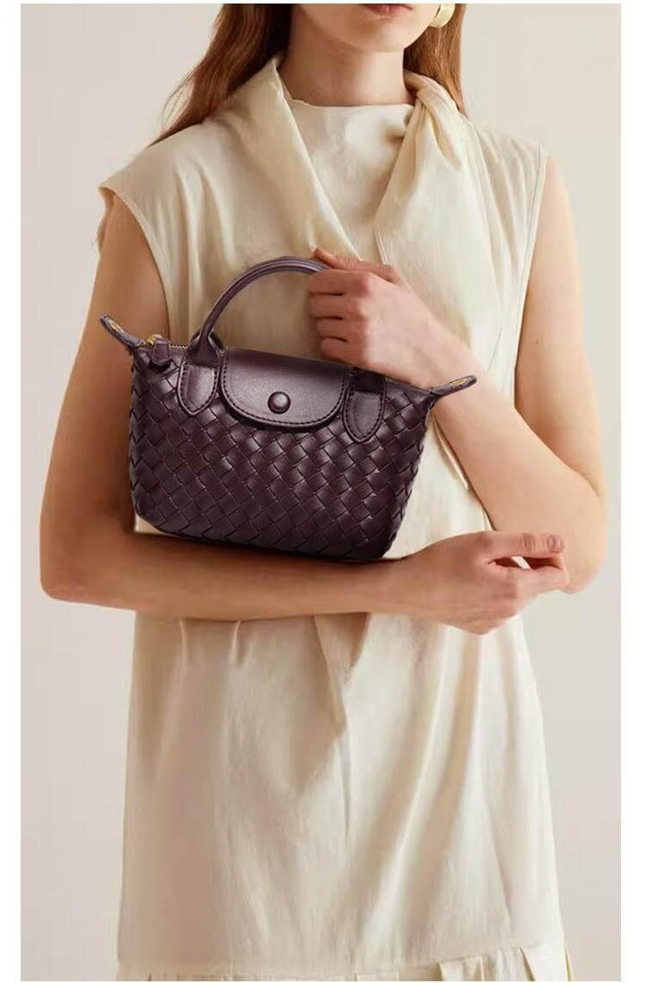 Compact women's mini bag with stylish woven design & durable faux leather details.