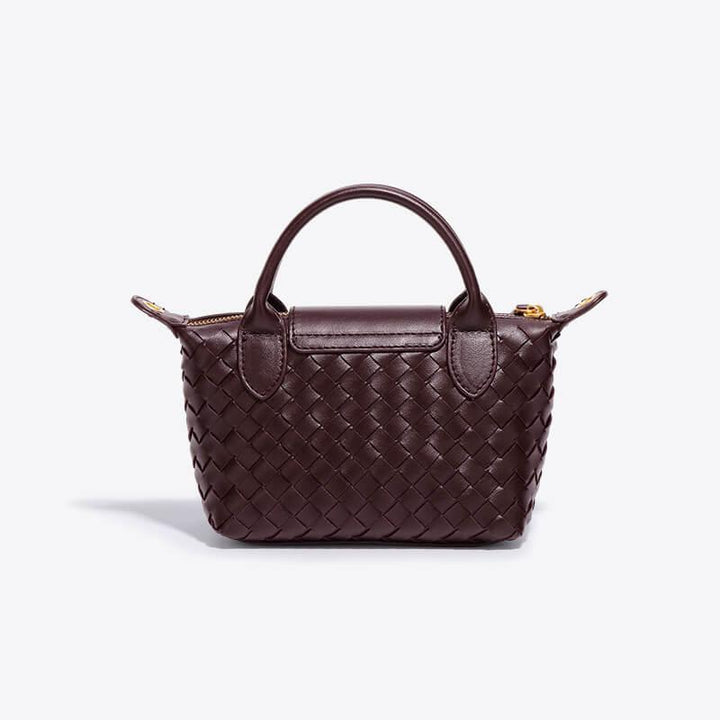 Modern women's mini bag, unique handcrafted look woven pattern, versatile shoulder carry.
