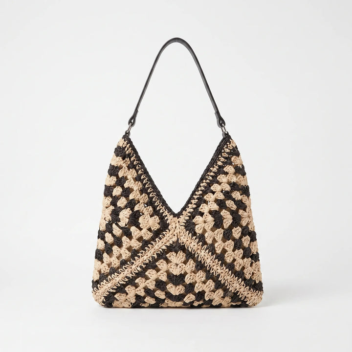 Handcrafted woven tote bag for women. Versatile casual shoulder bag, ideal for travel, beach, or everyday use.