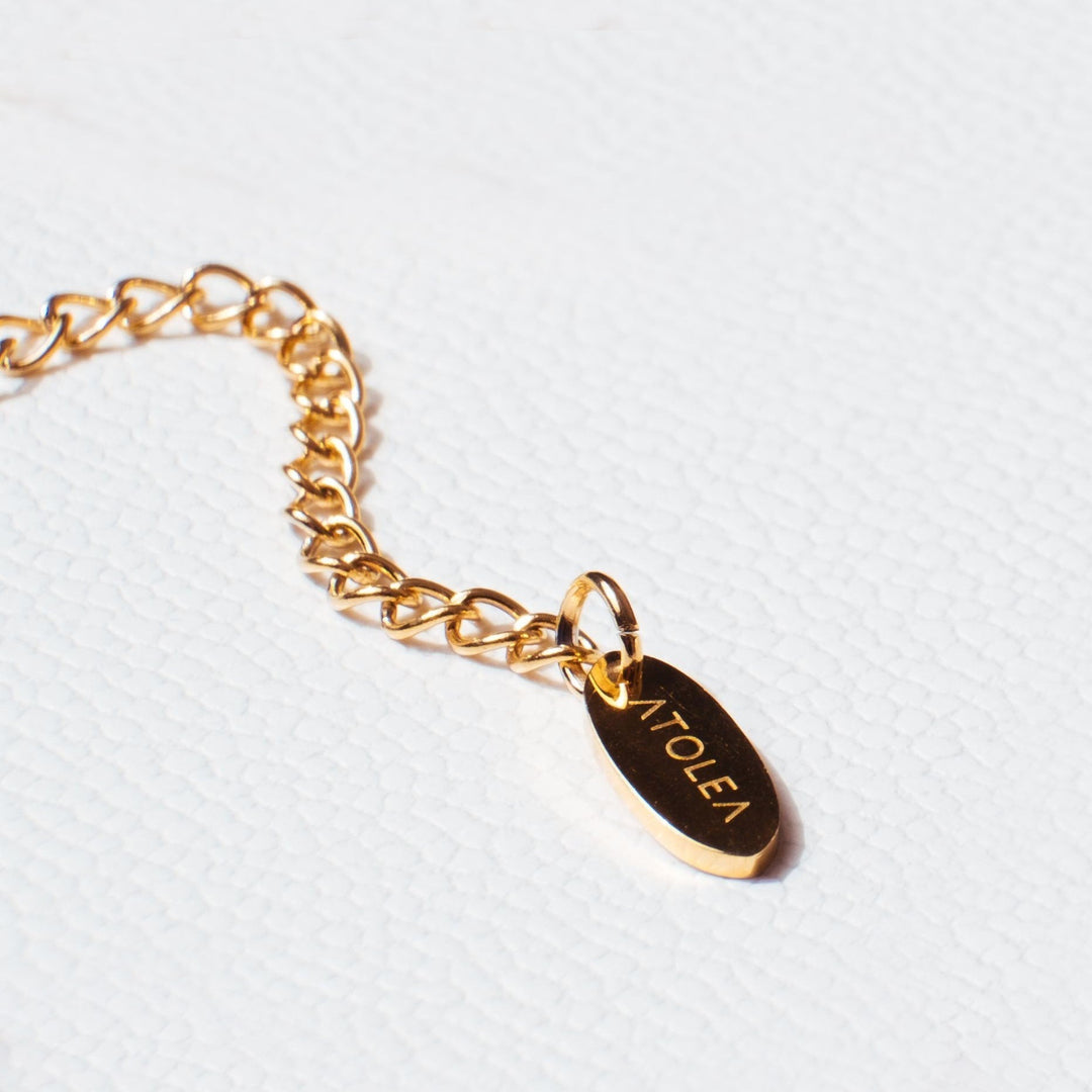 Amalfi style Figaro ankle bracelet for women. A subtle and elegant summer fashion accessory in gold or silver.