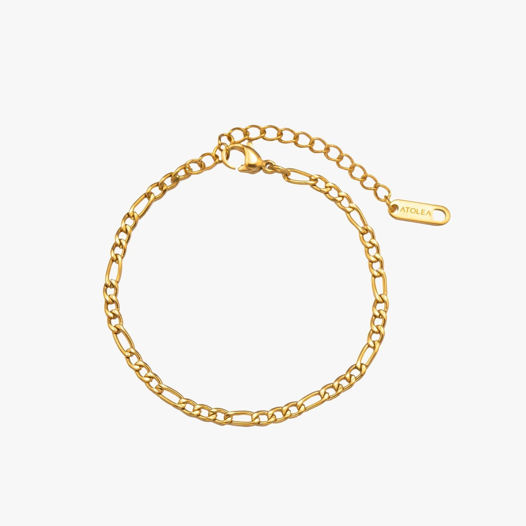 Women's subtle gold Figaro ankle bracelet, a dainty Amalfi-style summer anklet for minimalist fashion.