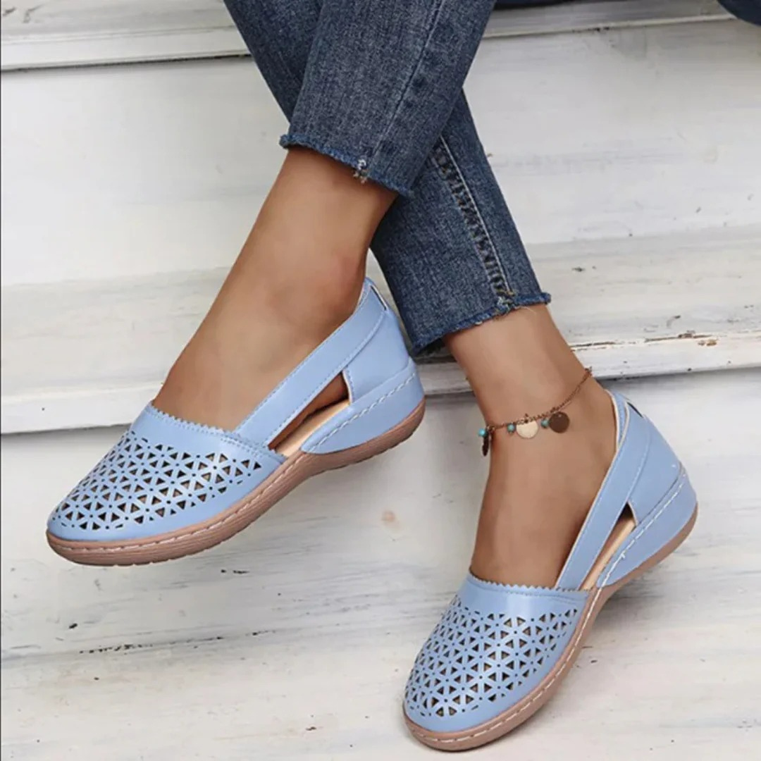 Elegant women's summer shoes, orthopedic for all-day comfort. Features a breathable cutout slip-on design.