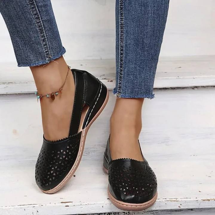 Lightweight women's orthopedic summer shoes. Comfortable slip-on flats with breathable cutout style.