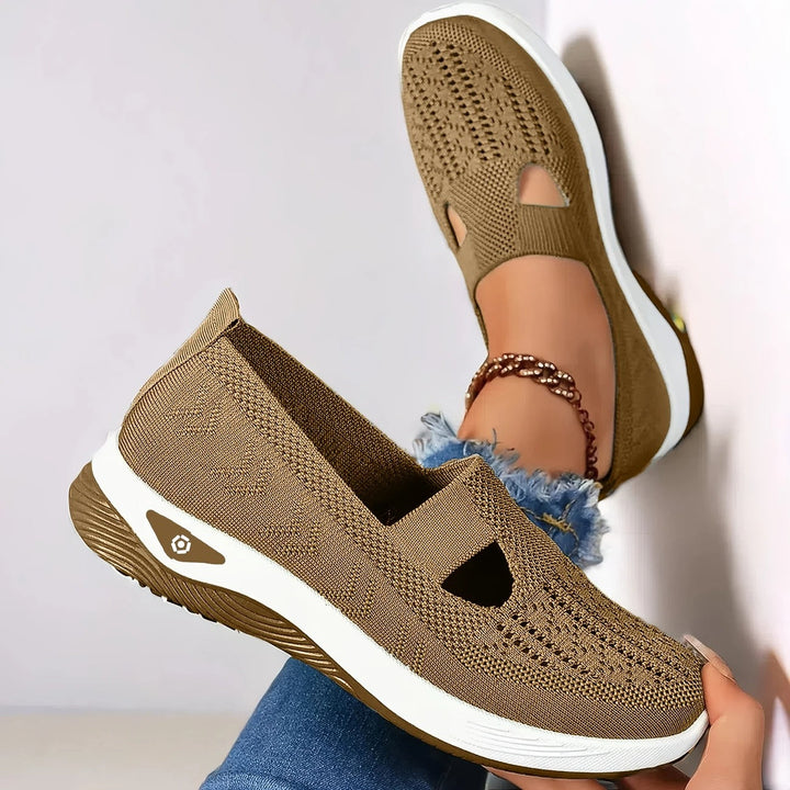 Supportive women's summer slip-on sneakers with contoured arch for all-day wear.
