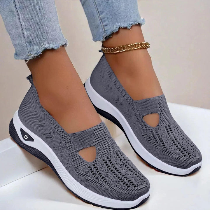 Lightweight women's slip-on sneakers with arch support, great for summer casual style.