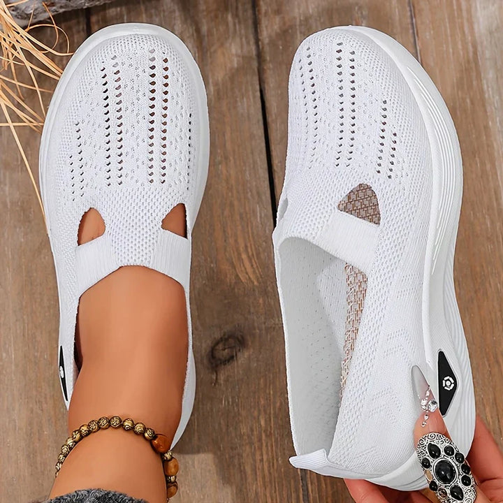 Modern women's easy wear shoes, featuring foot support & ergonomic design for comfort.
