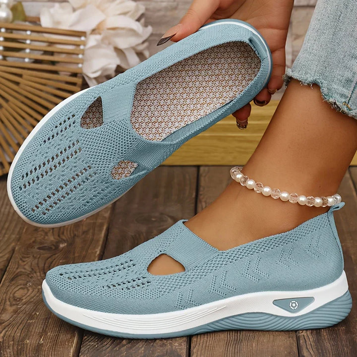 Comfortable women's slip-on shoes in white, perfect supportive footwear for any day.